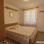 Residential Villaggio Innamorata アパートホテル